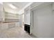 Luxurious closet featuring custom built-ins, vanity area, drawers, ample storage, and designer finishes at 30308 W Whitton Ave, Buckeye, AZ 85396