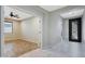 Bright entryway next to the home office with a decorative front door at 30308 W Whitton Ave, Buckeye, AZ 85396