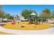 Community playground with climbing structures, spring riders, and a slide offers a fun space for children at 30308 W Whitton Ave, Buckeye, AZ 85396