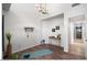 Bonus room/office space offers lots of natural light with decorative touches and wood-style floors at 3224 E Desert Cove Ave, Phoenix, AZ 85028