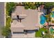 Aerial view of the property showcasing the pool, outdoor entertainment area, and backyard at 3460 E Lynx Pl, Chandler, AZ 85249