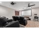 Home theater features comfortable seating, a projector screen, and a popcorn machine for movie nights at 3460 E Lynx Pl, Chandler, AZ 85249