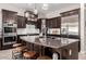 Well-appointed kitchen with granite countertops, stainless steel appliances, and stylish backsplash at 3460 E Lynx Pl, Chandler, AZ 85249