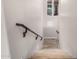 Carpeted staircase with wood railing and an inspirational wall decal near a window at 3460 E Lynx Pl, Chandler, AZ 85249