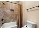 Bathroom showcasing a bathtub with tiled walls, a shower, and modern fixtures for a luxurious feel at 3523 E Presidio Cir, Mesa, AZ 85213