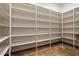 Walk-in pantry with ample shelving for organized storage at 3523 E Presidio Cir, Mesa, AZ 85213