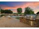 Resort style pool and outdoor grill area offering a relaxing atmosphere with mature trees and outdoor entertaining features at 3523 E Presidio Cir, Mesa, AZ 85213