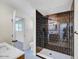 Modern bathroom with tiled shower and stylish vanity at 3650 E Laurel Ln, Phoenix, AZ 85028