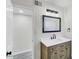 Bathroom with vanity and decorative light fixture at 3650 E Laurel Ln, Phoenix, AZ 85028