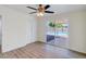 Bedroom with sliding glass doors providing pool views at 3650 E Laurel Ln, Phoenix, AZ 85028