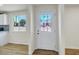Bright entryway featuring a new door with glass inserts and a modern aesthetic at 3650 E Laurel Ln, Phoenix, AZ 85028