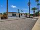 Inviting single-story home featuring desert landscaping and a private, fenced yard at 3650 E Laurel Ln, Phoenix, AZ 85028