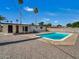 A backyard with a fenced pool and a well maintained outdoor space at 3650 E Laurel Ln, Phoenix, AZ 85028