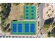 Aerial view of tennis courts with a parking lot and trees at 3650 E Laurel Ln, Phoenix, AZ 85028