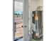 A new water heater installed in a utility room near an open doorway at 3650 E Laurel Ln, Phoenix, AZ 85028