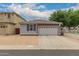 Charming single-story home with a two-car garage and well-maintained landscaping at 3756 E Kerry Ln, Phoenix, AZ 85050