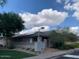Exterior shot of community mailboxes and nearby home with solar panels on the roof at 3756 E Kerry Ln, Phoenix, AZ 85050