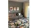 Cozy living room showcasing a floral rug, comfortable sofa, and stylish decor at 3756 E Kerry Ln, Phoenix, AZ 85050