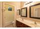 Bathroom featuring a double sink vanity, and a connected toilet and shower at 4241 E Andre Ave, Gilbert, AZ 85298