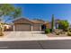 Charming single-Gathering home featuring desert landscaping, three-car garage, and a neutral color palette at 4241 E Andre Ave, Gilbert, AZ 85298