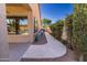 Exterior side view of home features a covered patio and landscaped walkway at 4241 E Andre Ave, Gilbert, AZ 85298