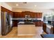 Spacious kitchen equipped with stainless steel appliances, ample cabinetry, and granite countertops at 4241 E Andre Ave, Gilbert, AZ 85298