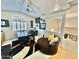Bright home office featuring a sleek desk, comfortable seating, and ample natural light at 4446 E Woodridge Dr, Phoenix, AZ 85032