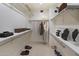 Spacious walk-in closet with ample shelving and hanging space for organized storage and accessory display at 4446 E Woodridge Dr, Phoenix, AZ 85032