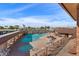 Inviting community pool and spa surrounded by lush landscaping at 5735 E Mcdowell Rd # 147, Mesa, AZ 85215