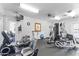 Bright fitness center with modern exercise equipment and weights at 5735 E Mcdowell Rd # 147, Mesa, AZ 85215