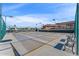 Multiple shuffleboard courts provide a fun and engaging recreational option for residents, set against a backdrop of community buildings at 5735 E Mcdowell Rd # 147, Mesa, AZ 85215