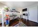 bedroom featuring a bunk bed, entertainment area, and gray walls at 6533 N 10Th Pl, Phoenix, AZ 85014