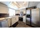 Modern kitchen with stainless steel appliances and bright lighting at 6533 N 10Th Pl, Phoenix, AZ 85014