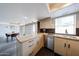 Spacious kitchen with stainless steel appliances, ample counter space and open layout at 6533 N 10Th Pl, Phoenix, AZ 85014