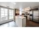 Well-lit kitchen features stainless steel appliances and ample counter space at 6533 N 10Th Pl, Phoenix, AZ 85014