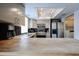 Modern kitchen with stainless steel appliances, light cabinetry, butcher block countertops, and recessed lighting at 6533 N 10Th Pl, Phoenix, AZ 85014