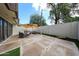 Inviting outdoor patio space featuring comfortable seating under an umbrella, complete with outdoor lighting at 6533 N 10Th Pl, Phoenix, AZ 85014
