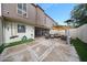 Charming private outdoor patio for entertaining, featuring comfortable seating with shade and outdoor lighting at 6533 N 10Th Pl, Phoenix, AZ 85014