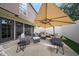 Enjoy the comfort of this private outdoor patio, complete with comfortable seating, shade and outdoor lighting at 6533 N 10Th Pl, Phoenix, AZ 85014