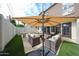 Comfortable outdoor patio, perfect for relaxing with ample seating, shade and outdoor lighting at 6533 N 10Th Pl, Phoenix, AZ 85014