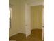 Neutral-colored bedroom, showing the door leading into the hallway at 6687 S Banning St, Gilbert, AZ 85298