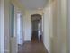 Bright hallway with archways and neutral paint leading through the house at 6687 S Banning St, Gilbert, AZ 85298