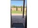 View of the backyard featuring a manicured lawn and an extended patio with classic brick pavers at 7312 S 13Th Way, Phoenix, AZ 85042