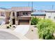 Attractive two-story home featuring a tiled roof, a two-car garage, and well maintained landscaping at 7312 S 13Th Way, Phoenix, AZ 85042