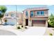 Charming two-story home featuring a balcony, manicured landscaping, and a two-car garage at 7312 S 13Th Way, Phoenix, AZ 85042