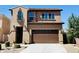 Charming two-story home with a well-manicured front yard and a spacious two-car garage at 7312 S 13Th Way, Phoenix, AZ 85042