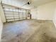 Spacious two-car garage with ample room for parking and storage at 7312 S 13Th Way, Phoenix, AZ 85042