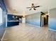 Spacious living room featuring hardwood floors, an open layout, and abundant natural light at 7312 S 13Th Way, Phoenix, AZ 85042