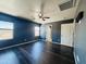 Stylish main bedroom with hardwood floors, natural light, and a spacious layout at 7312 S 13Th Way, Phoenix, AZ 85042