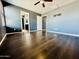 Bright main bedroom with hardwood floors and an ensuite bathroom; perfect for relaxation at 7312 S 13Th Way, Phoenix, AZ 85042
